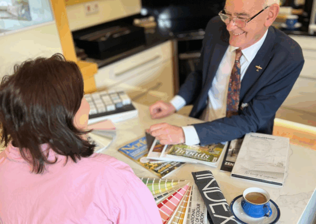 Client attending a Design Studio Session at Anglia Kitchens & Bedrooms showroom in Norfolk discussing bespoke interior ideas