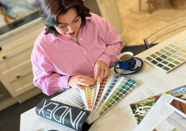 Client attending a Design Studio Session at Anglia Kitchens & Bedrooms showroom in Norfolk discussing bespoke interior ideas